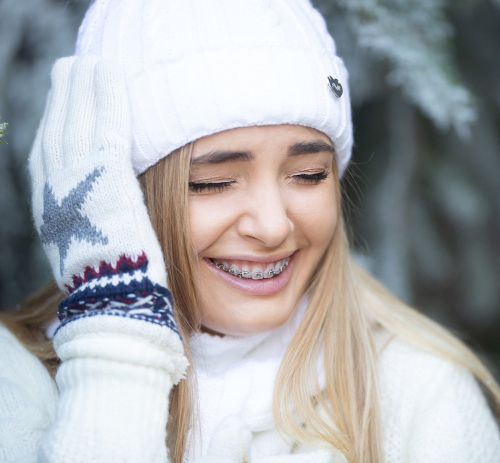 Smiling girl wearing braces